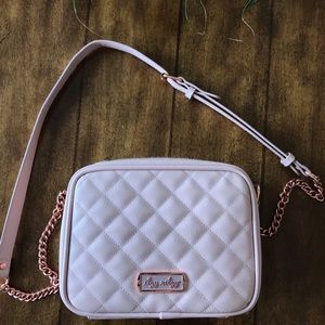 Itzy Ritzy Double Take Crossbody bag pink